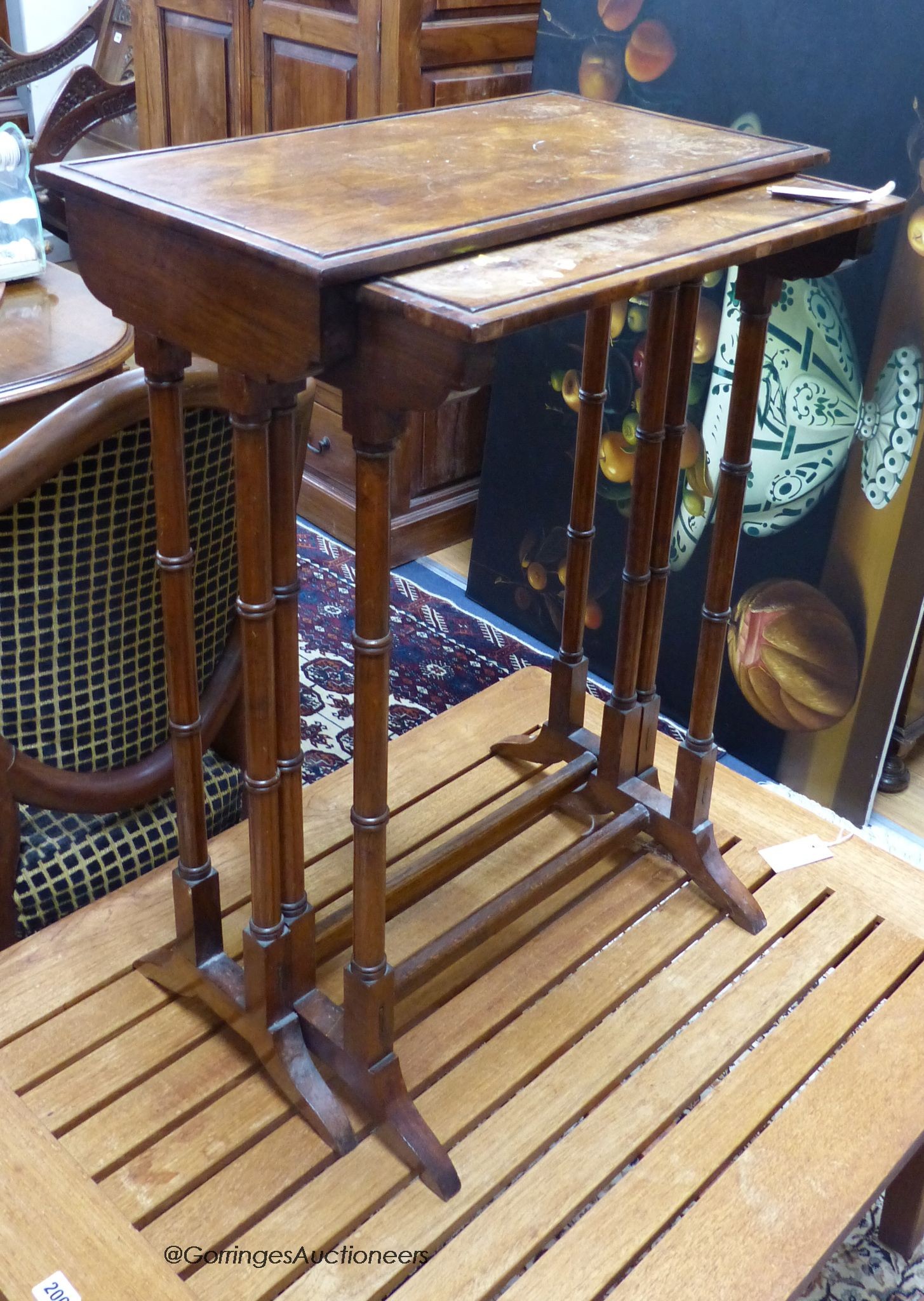 A nest of two early 19th century rosewood occasional tables, width 53cm, depth 30cm, height 73cm
